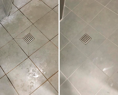 Shower Floor Before and After a Service from Our Tile and Grout Cleaners in Satellite Beach